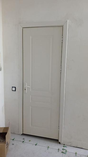 2106 qapi: Ağ rəngli 2 ədəd taxta qapı eni 76smhundürü 205 sm . Yeni Yasamal — 2
