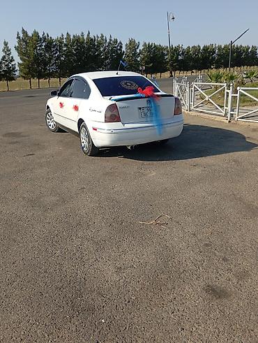 volkswagen polo v: Volkswagen Passat (B5) sedan – ağ rəngli, 4 qapı, önlü-arxalı geniş — 6