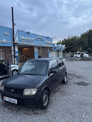 муравей с бензином: Daihatsu Cuore: 2001 г., 1 л, Механика, Бензин, Купе — 8