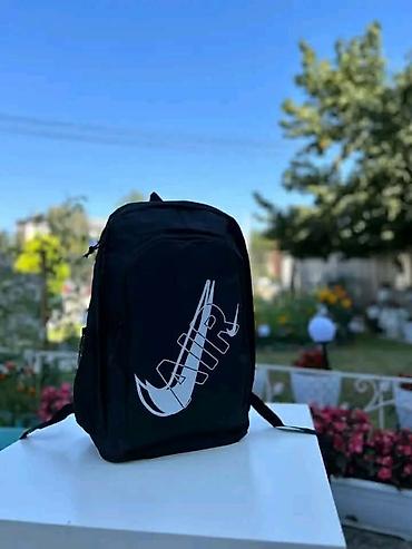 doca torbe: Rančevi sa štampom Nike motiva - Modeli: roze ranac sa žutim Nike — 2