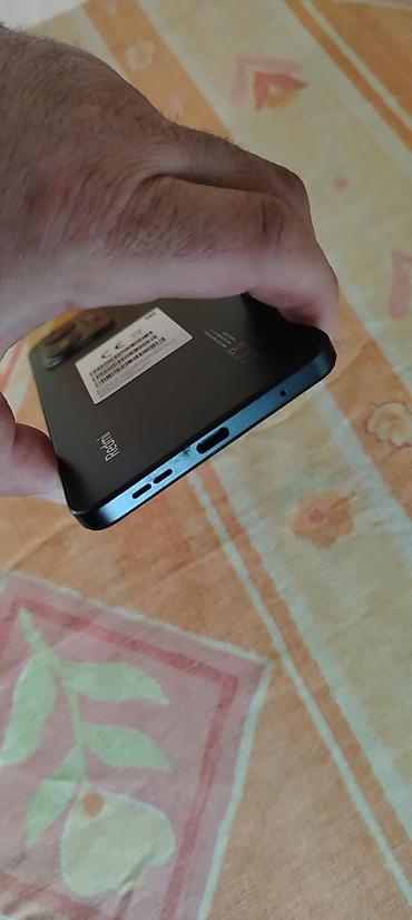Redmi: Xiaomi Redmi Note 12 (görsellərdə) - Ekran: 6.67" AMOLED, mərkəzi — 6