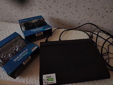 ps 3 cd: Sony PlayStation 3 Super Slim konsolu + 2 ədəd DualShock 3 simsiz pult — 2