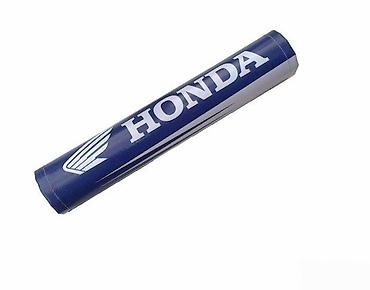 oval: Cilindrična podloga za volan sa natpisom „HONDA“ u beloj boji na — 1