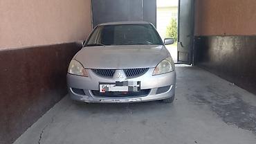 Mitsubishi Lancer: 2004 г., Механика, Седан