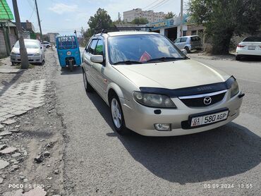 мазда fk: Mazda 323: 2003 г., 1.6 л, Механика, Бензин, Хетчбек