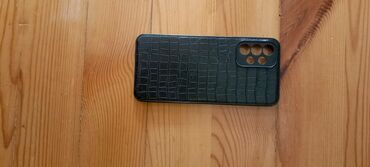 telefon tutan: Samsung a23 arxalıq kabro