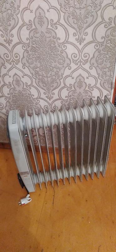 isti su torbasi: Yağlı radiator tipli elektrik qızdırıcısı - Tip: Elektrik yağ — 1
