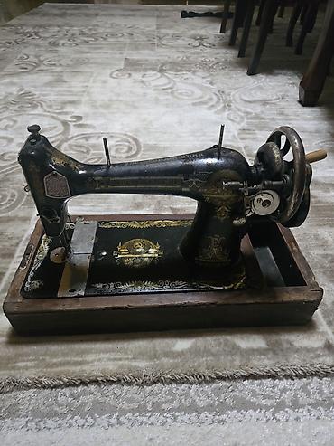 tikis masni: Kolleksiyaçılar və dekor həvəskarları üçün köhnə tip əl tikiş maşını — 1