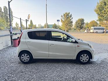 бу болон: Daihatsu Cuore: 2009 г., 1 л, Автомат, Бензин, Хэтчбэк — 3