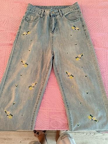 Qadın cins şalvar - Rəng: açıq mavi denim, yüngül yuyulma effekti -