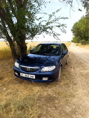 электромобиль neta: Mazda 323: 2001 г., 1.6 л, Механика, Бензин, Хэтчбэк