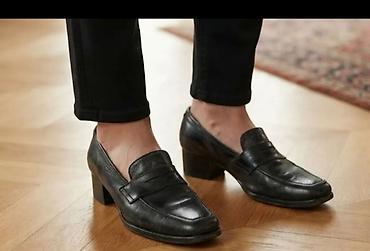 Crne kožne mokasine sa potpeticom - Klasičan penny loafer dizajn sa