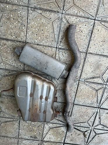 e46 katalizator: Avtomobil üçün egzoz sistemi hissələri Tərkib: - Səsboğucu (silindrik — 2