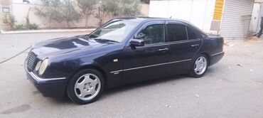 Mercedes-Benz E 240: 2.4 л | 1999 г. Седан