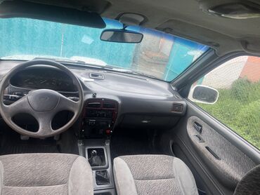 машина карасуу: Kia Sportage: 1995 г., 2.4 л, Механика, Бензин, Универсал