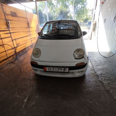 купить двигатель д 245: Белый автомобиль Daewoo Matiz, компактный хэтчбек, идеально подходящий