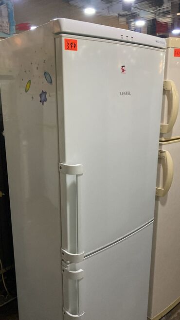 marojna soyuducusu: VESTEL iki qapılı soyuducu - Yuxarıda soyuducu bölmə, aşağıda