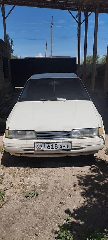 авто элек: Mazda 626: 1991 г., 2 л, Кол менен иштөөчү, Седан — 1