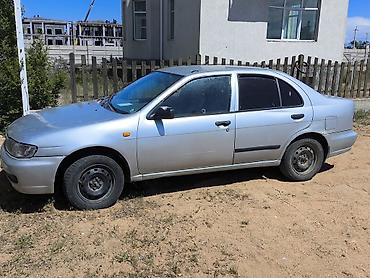 нур мото: Nissan Almera: 1995 г., Механика, Бензин, Седан — 4