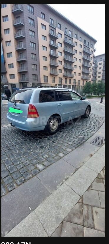 çeşqa maşını: Toyota Corolla Fielder universal texismator suğorta təzə olunub