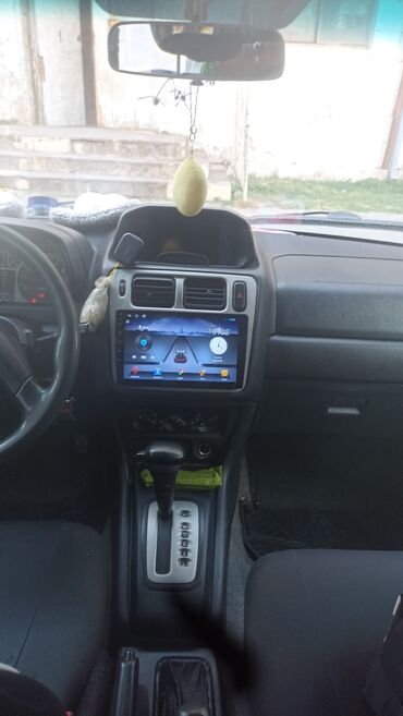 afdamabil ve xususi texnka: Mitsubishi Pajero iO (4 qapı) – ağ rəngdə, avtomatik transmissiya