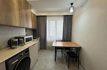 Продажа квартир: 1 комната, 32 м², Элитка, 9 этаж, Дизайнерский ремонт — 2
