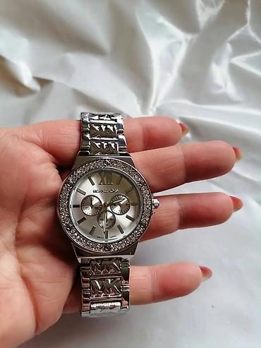 Ručni satovi: Ženski ručni satovi – elegantni modeli sa metalnim narukvicama - — 13