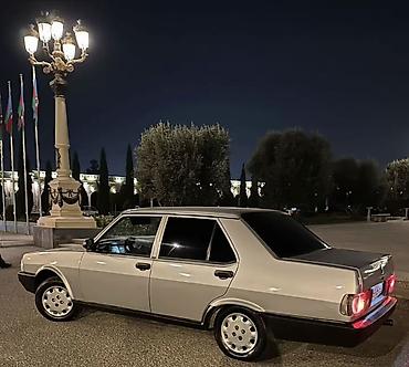 Tofas: Model: Tofaş Şahin (sedan) Kuzov: 4 qapılı, gümüşü rəng, qara plastik — 2