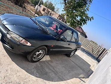 geely preface: Продается легковой автомобильмитсубиши протон 1996 года,чёрного — 3