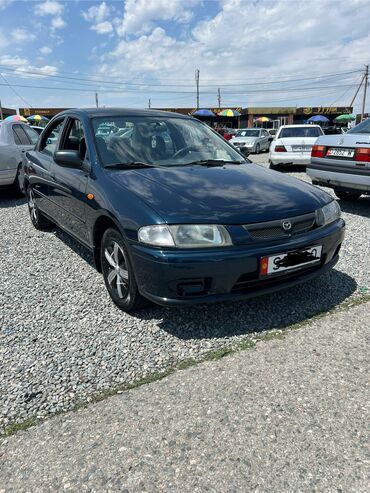 Mazda: Mazda 323: 1999 г., 1.5 л, Механика, Бензин, Седан