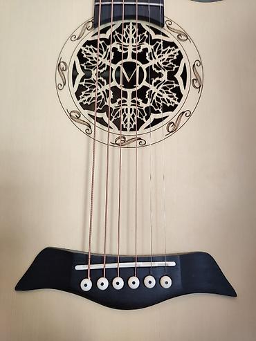 gitara simləri: Elektro akustik gitara Model:Smiger LG-07 Üst: Şam ağacı Qol: Gül — 2