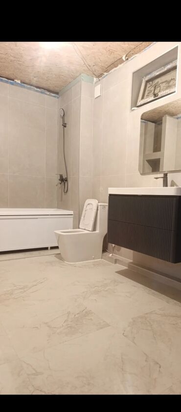 Укладка плитки: Услуги по облицовке ванных комнат и душевых плиткой/керамогранитом под — 23