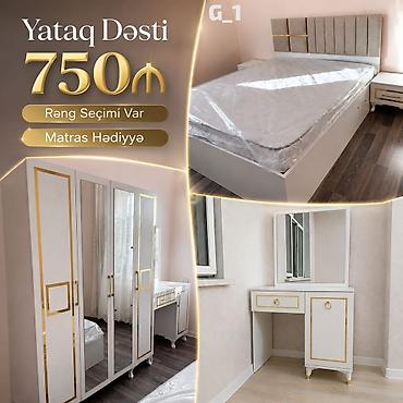 Ağ və qızılı detallarla hazırlanmış yataq dəsti. Dəstə çarpayı, dolab