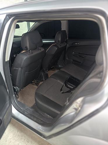 lada 06: Opel Astra: 2008 г., 1.8 л, Автомат, Газ, Универсал — 4