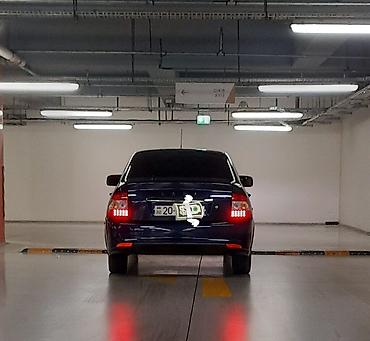lada diskləri: LADA Priora xetcbek – tünd mavi rəng, tam qapalı salonlu. Xarici — 3