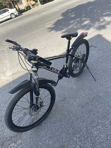 Velosiped 24 lük. Az işlənib, heç bir problemi yoxdur. 10 skorus