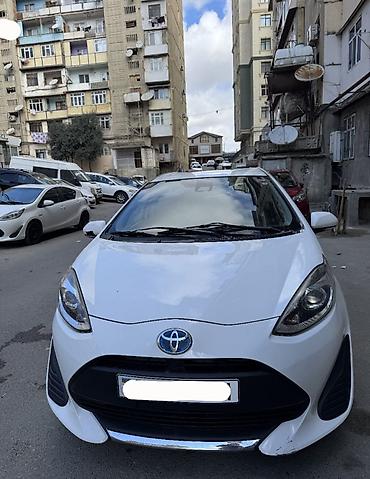 mini cooper kreditle: Toyota Aqua (Hybrid) – şəhər üçün ideal, aşağı yanacaq sərfi ilə — 1
