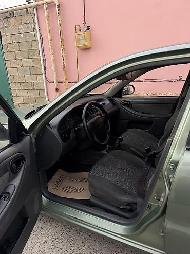 suzuki grand vitara 2.7: Daewoo Lanos: 1.5 l | 2010 il — 8