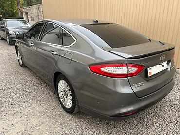 зона: Ford Fusion: 2013 г., 2 л, Автомат, Гибрид, Седан — 6
