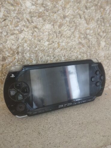 psp сколько стоит: PSP satılır.Íçerisinde 2 oyun var.Real alıcıya endirim olunacaq