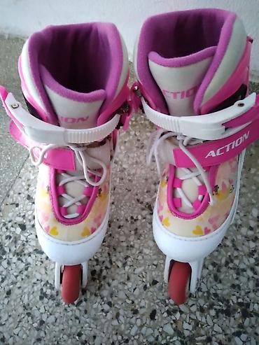 powerslide roleri: Roleri Action roze podesivi br. 30-33, sa pertlama i silikonskim — 2