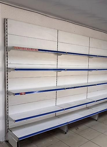 Соода жабдуулары: Настенная торговая стеллажная система для магазина продам недорого — 1