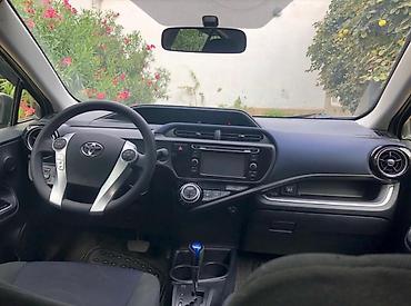 qadin masini: Toyota Prius: 1.5 l | 2015 il Hetçbek — 8
