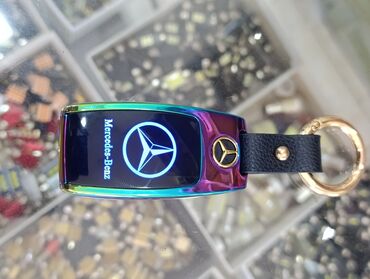 Прицепы: Mercedes-Benz loqosu ilə bəzədilmiş bu çoxfunksiyalı açarlıq həm də