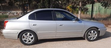 Hyundai: Hyundai Elantra: 1.6 l | 2004 il Sedan — 4