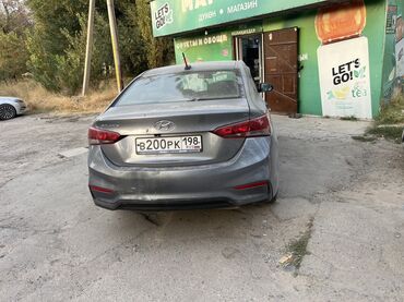 киа салярис: Hyundai Solaris седан, серый цвет кузова. Основные характеристики: -