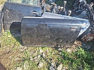 car odzaci: AUDI A6 C6 4F PREDNJA LEVA VRATA CRNA BOJA | vrata su ne ostecena — 1