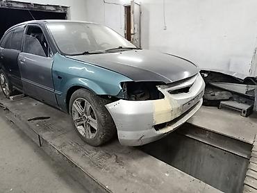 mazda 2000: Mazda 323: 2004 г., 2 л, Автомат, Бензин, Хэтчбэк — 1