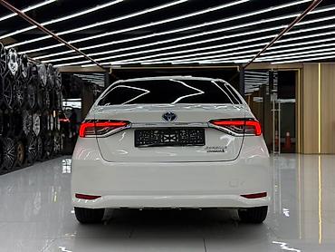на corolla: Toyota Corolla: 2019 г., 1.8 л, Гибрид, Седан — 7