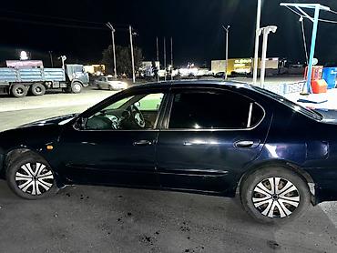 Другие автомобили: Седан бизнес‑класса темно-синего цвета. Просторный салон с мягкой — 6